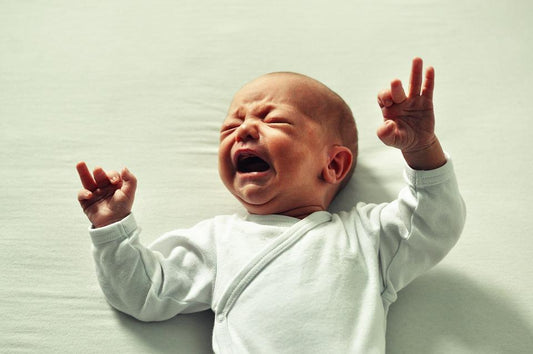 How to soothe my newborn baby crying without reason?